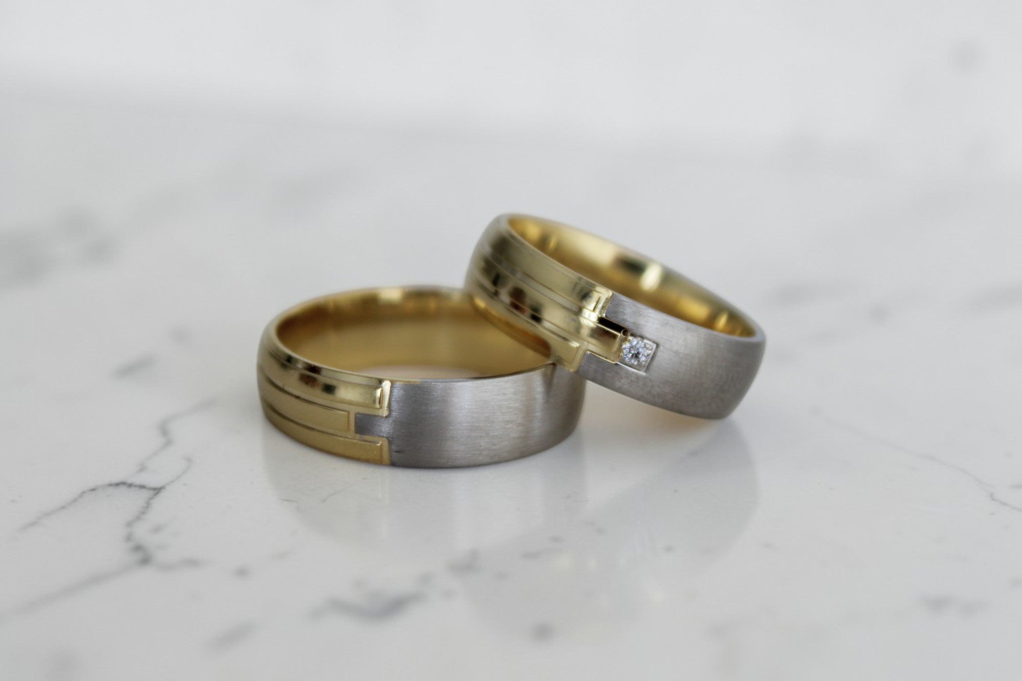 Christian Karikagyűrű Pár - 14K Fehér / Sárga Arany - 1 db 0.025 ct Gyémánt